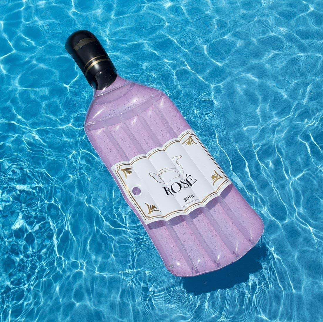 International Leisure Products Inc., Aufblasbare Schwimmliege „Rosé Bottle“ von Swimline – 90654